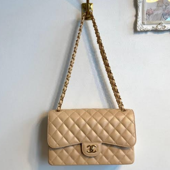 CHANEL Handbags - CHANEL Caviar Beige Jumbo Gold Hardware - Preloved